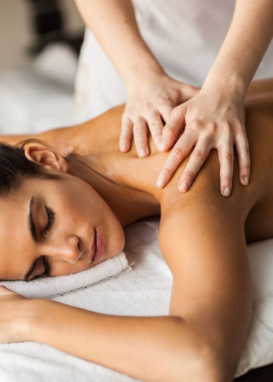 Client relaxing during a shoulder massage